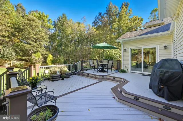 a view of a livingroom with furniture and a fireplace
