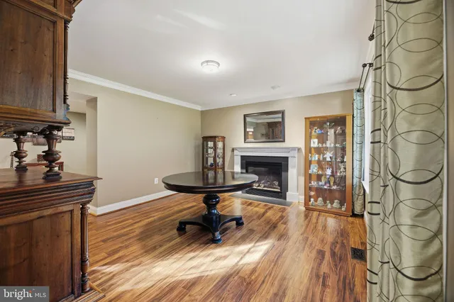 a view of a livingroom with furniture and staircase