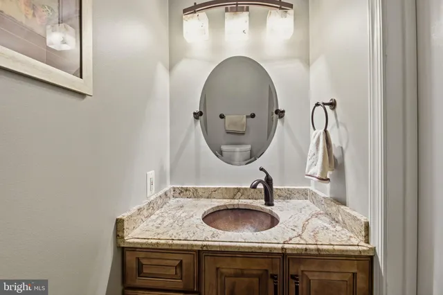 a bedroom with furniture and a dresser