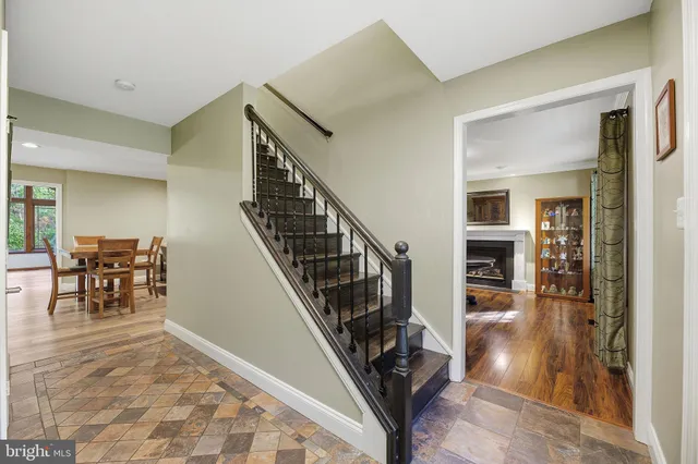 a view of walk in closet with clothes