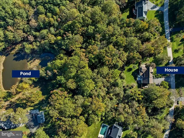 a house with a trees in front of it