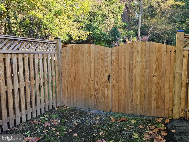 a aerial view of a house with a yard and garden