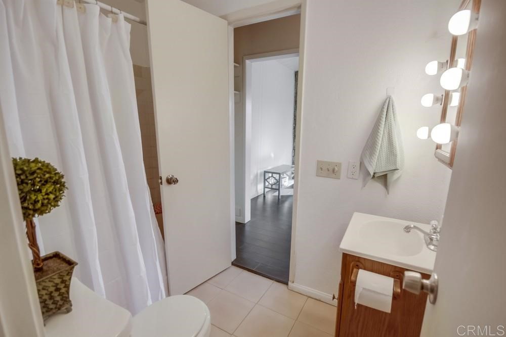 9913 Lindo Lane Lakeside, CA 92040 - Photo 17 of 53 a bathroom with a sink and toilet