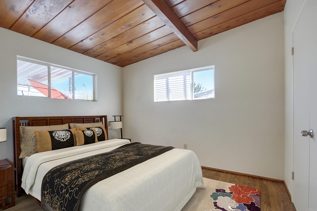 9913 Lindo Lane Lakeside, CA 92040 - Photo 21 of 53 a bedroom with a bed and a window