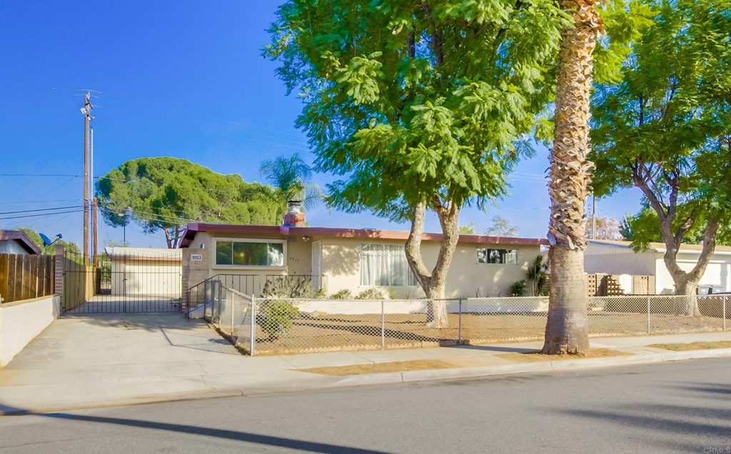 9913 Lindo Lane Lakeside, CA 92040 - Photo 33 of 53 a view of a house with backyard and sitting area