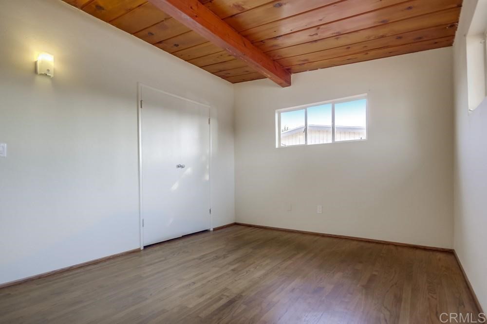 9913 Lindo Lane Lakeside, CA 92040 - Photo 36 of 53 an empty room with wooden floor