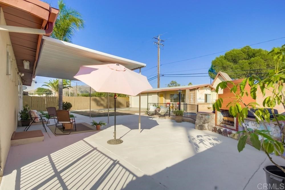 9913 Lindo Lane Lakeside, CA 92040 - Photo 47 of 53 a view of a patio with a table and chairs