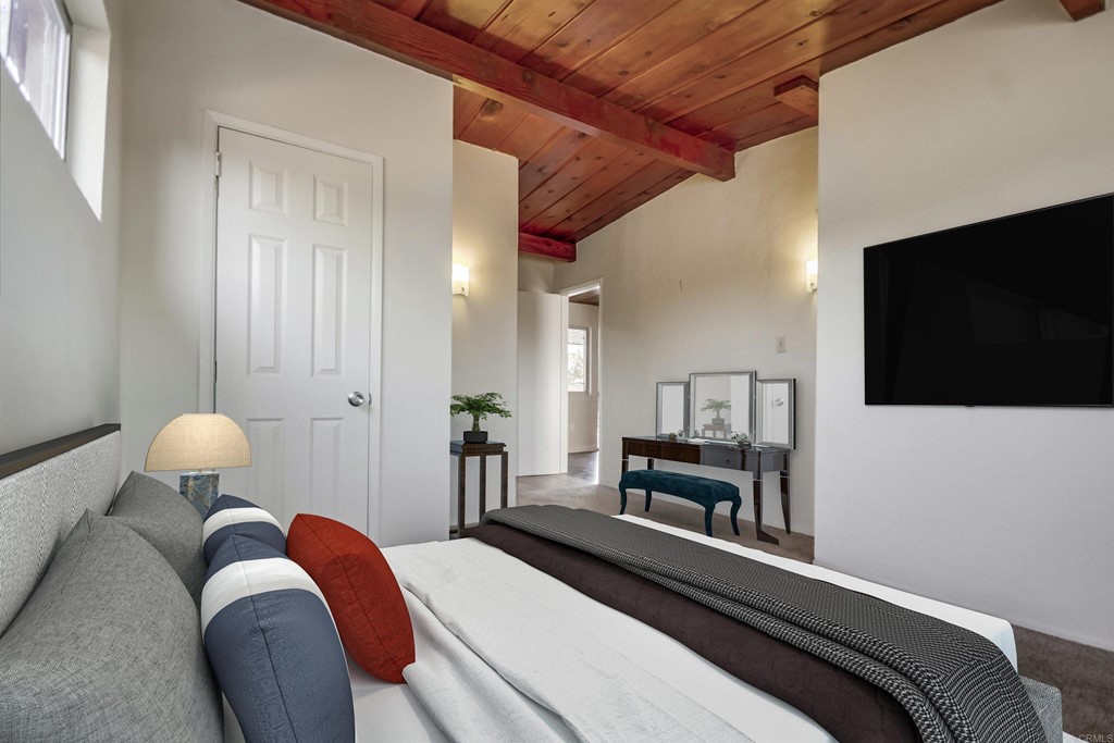 9913 Lindo Lane Lakeside, CA 92040 - Photo 7 of 53 a bedroom with a bed and a flat screen tv