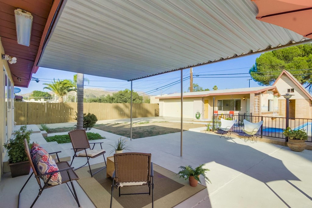 9913 Lindo Lane Lakeside, CA 92040 - Photo 10 of 53 a outdoor space with patio lots of furniture and umbrella