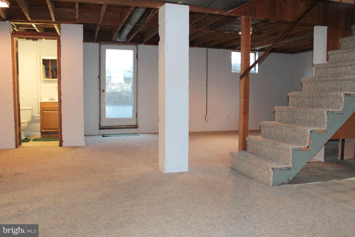 818 Medway Road Hagerstown, MD 21740 - Photo 27 of 30 Basement with Door to Rear Yard & Patio