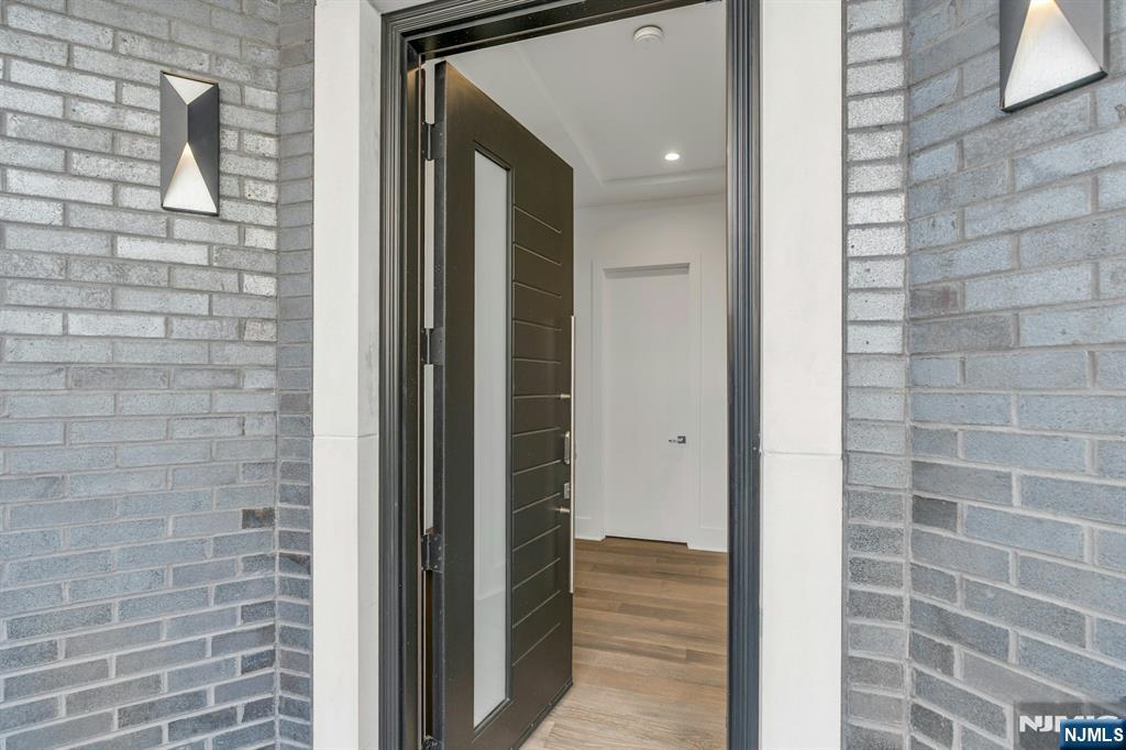 1238 River Road Edgewater, NJ 07020 - Photo 2 of 45 a bathroom with a shower and a sink