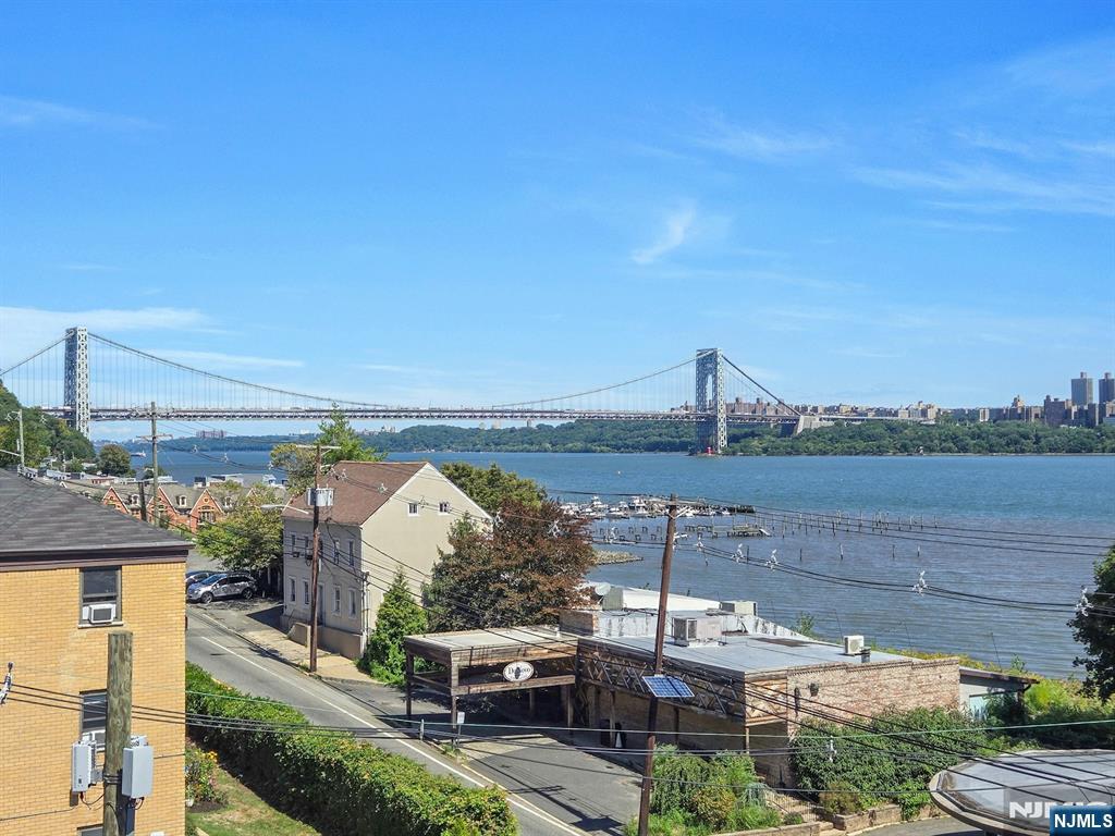 1238 River Road Edgewater, NJ 07020 - Photo 26 of 45 a view of a city from a lake
