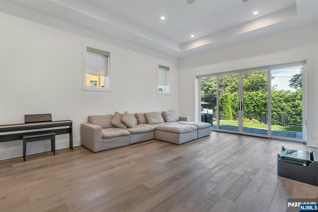1238 River Road Edgewater, NJ 07020 - Photo 32 of 45 a living room with furniture and a window