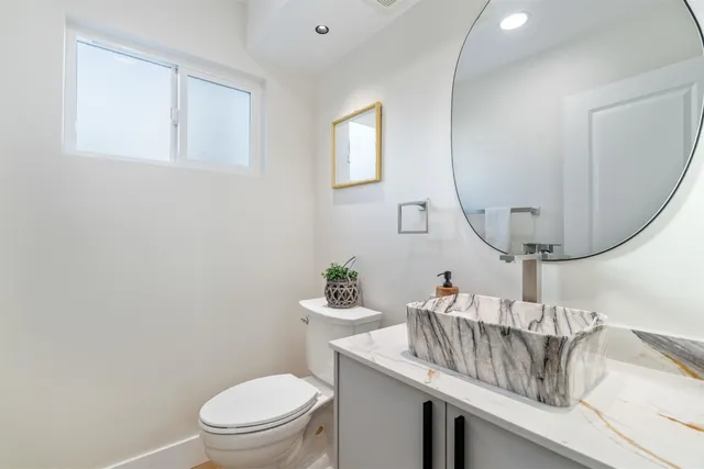 a bed room with a bed furniture and a window