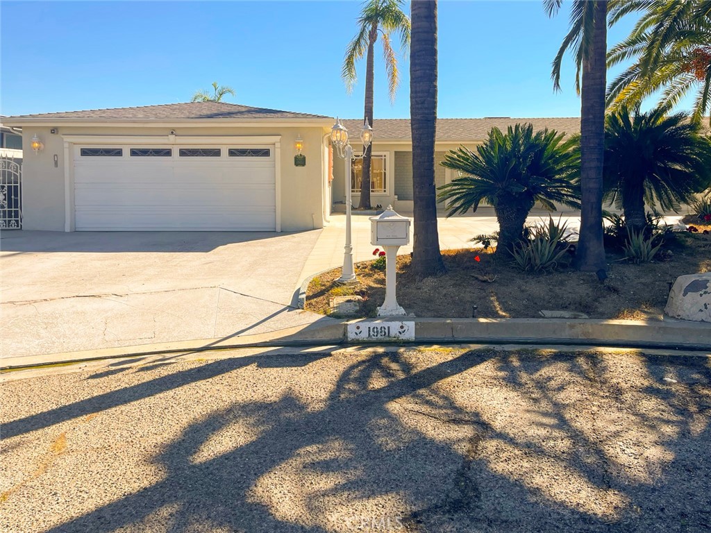 1981 Deermont Road Glendale, CA 91207 - Photo 2 of 49 a view of a swimming pool with a yard