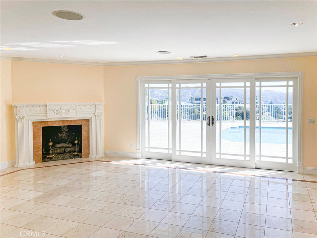 1981 Deermont Road Glendale, CA 91207 - Photo 31 of 49 a view of an empty room with a fireplace