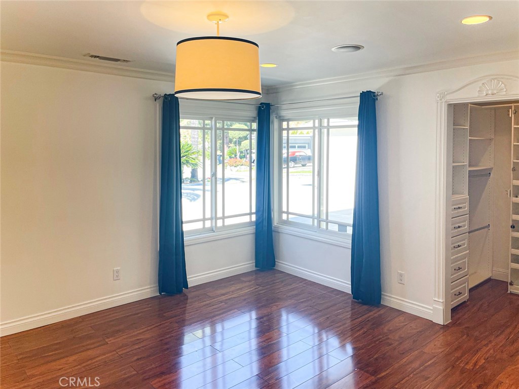 1981 Deermont Road Glendale, CA 91207 - Photo 33 of 49 wooden floor in an empty room with a window