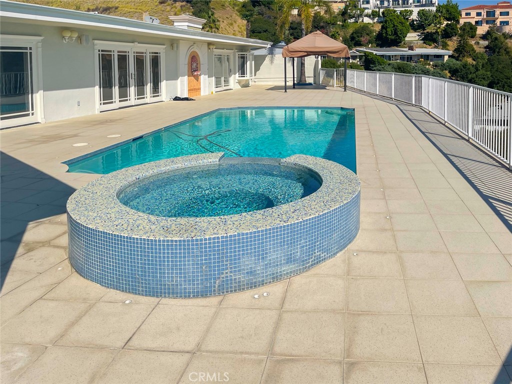 1981 Deermont Road Glendale, CA 91207 - Photo 46 of 49 a view of a house with a swimming pool