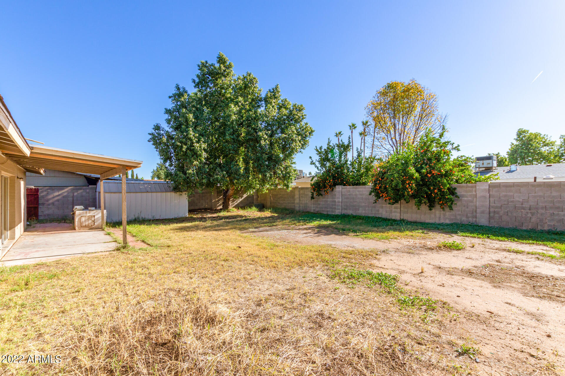 1225 West Halstead Drive Phoenix, AZ 85023 - Photo 19 of 19 a view of a house with a yard