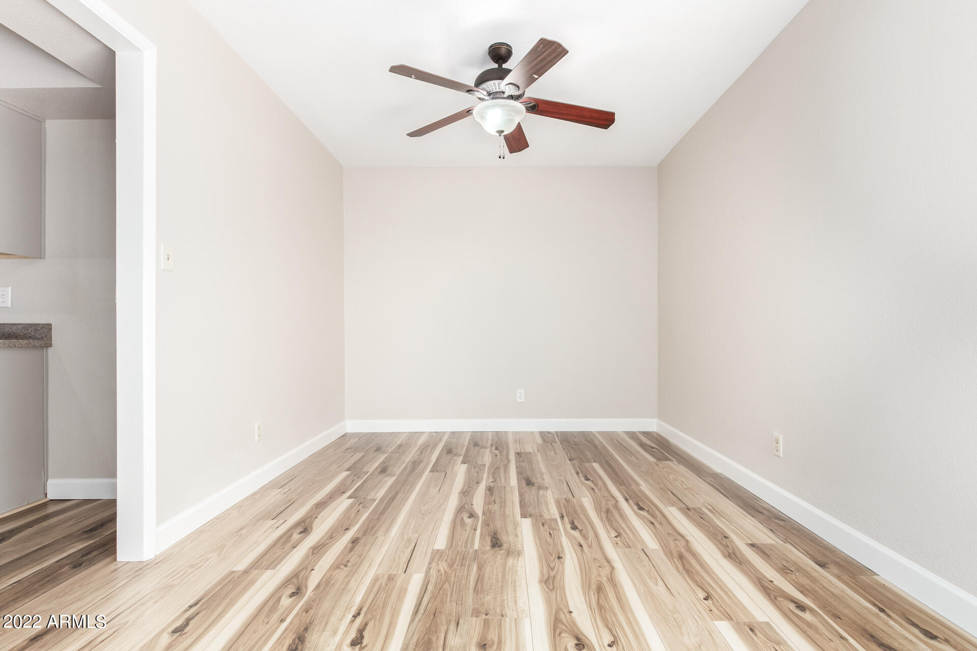 1225 West Halstead Drive Phoenix, AZ 85023 - Photo 8 of 19 a view of room with window and ceiling fan