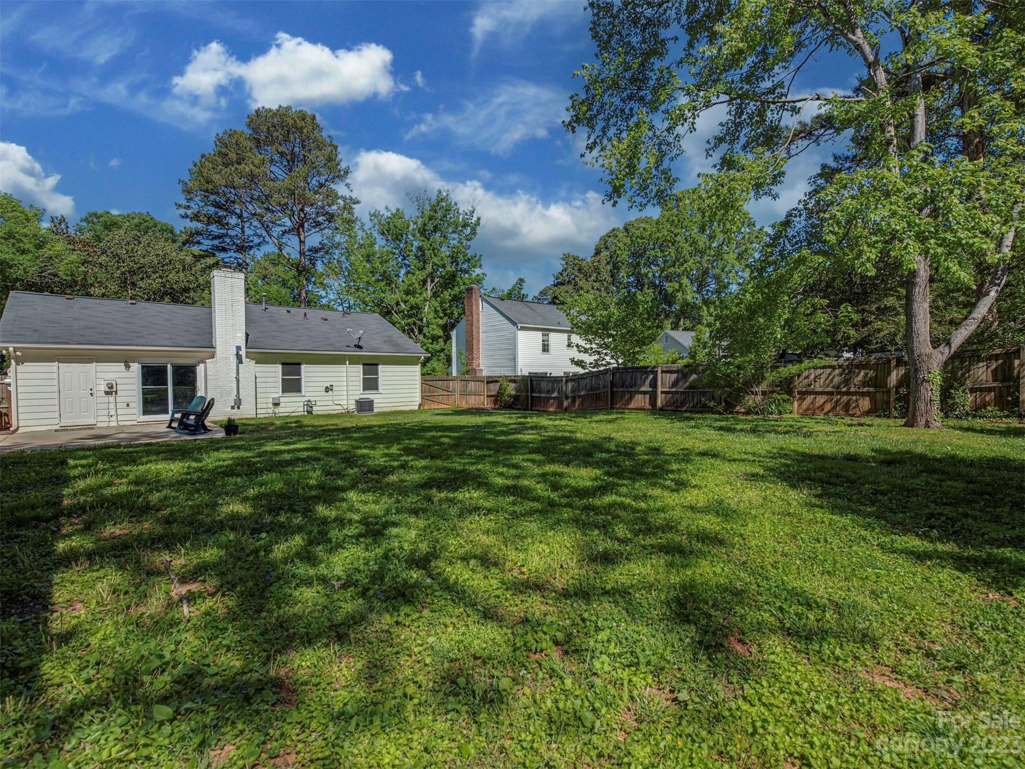 9613 Watergate Road Charlotte, NC 28270 - Photo 29 of 33 a front view of house with a garden