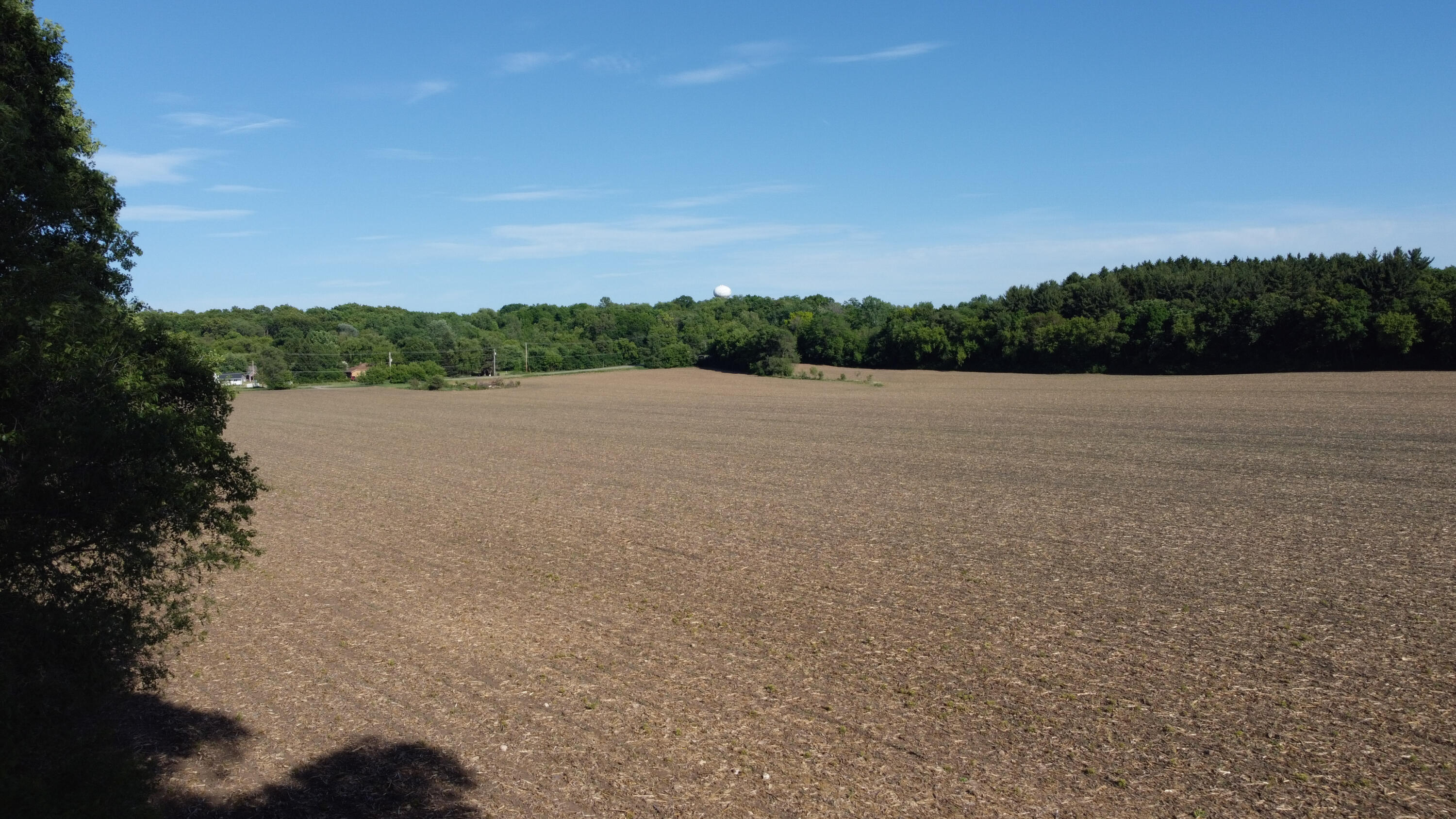 213 West State Road North Prairie, WI 53153 - Photo 36 of 37 Large lot backs up to this beautiful field