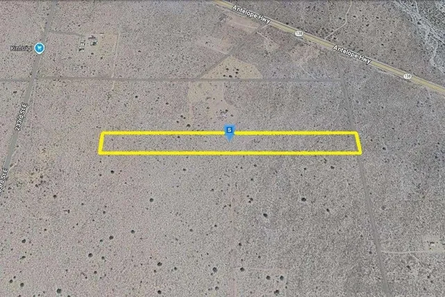 a view of a swimming pool and outdoor space