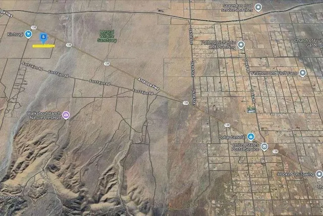 a view of beach and mountains