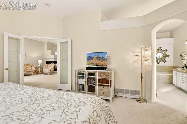 a bedroom with furniture and a bed