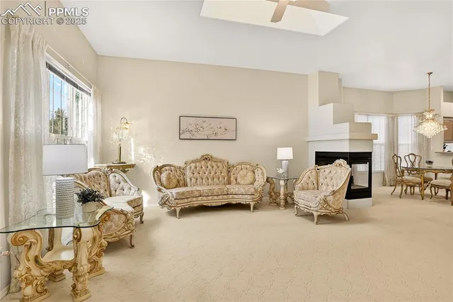 a bedroom with furniture and a fireplace