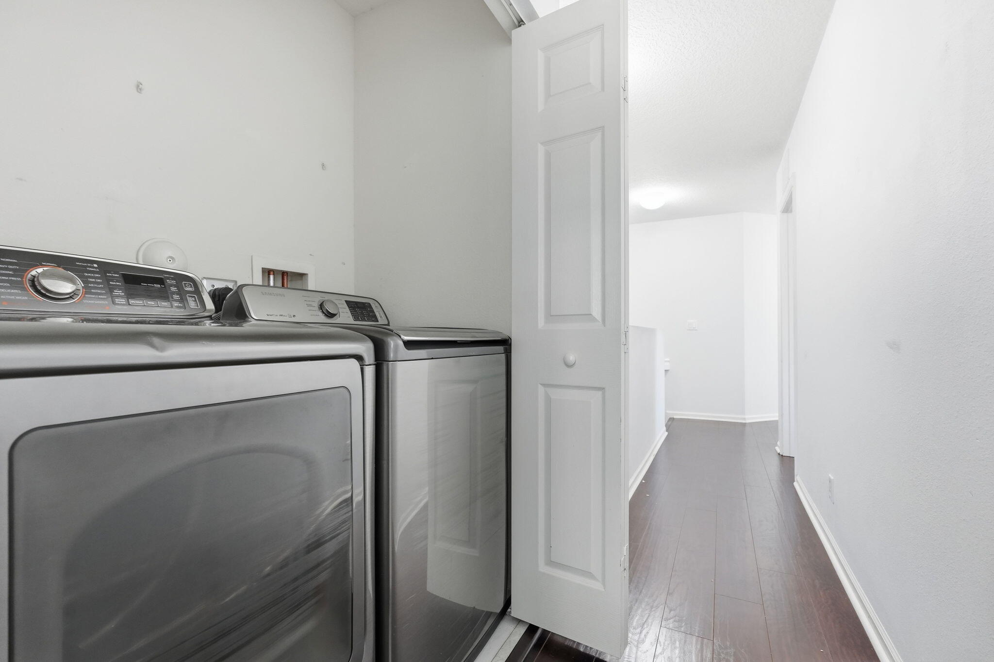 1086 Woodfield Road Greenacres, FL 33415 - Photo 25 of 32 a utility room with dryer and washer