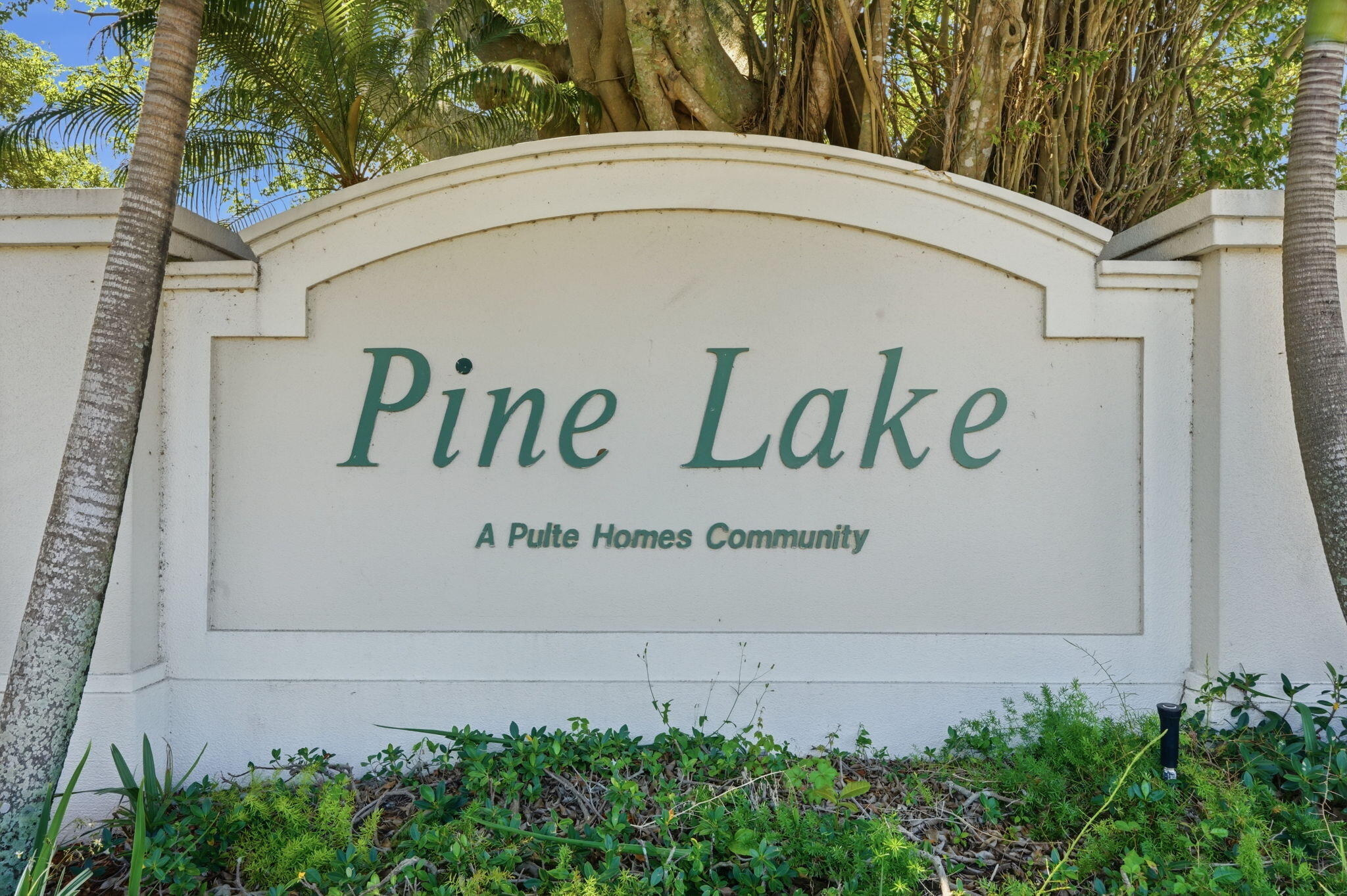 1086 Woodfield Road Greenacres, FL 33415 - Photo 32 of 32 a sign that is on the side of a building