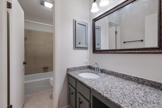 a view of porch with a glass door and front door