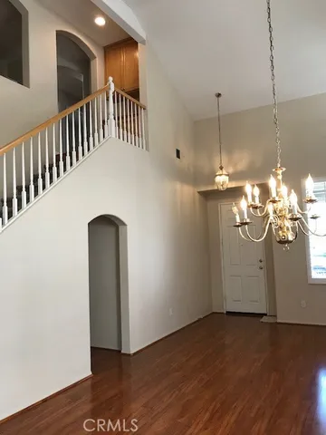 a view of a livingroom with wooden floor