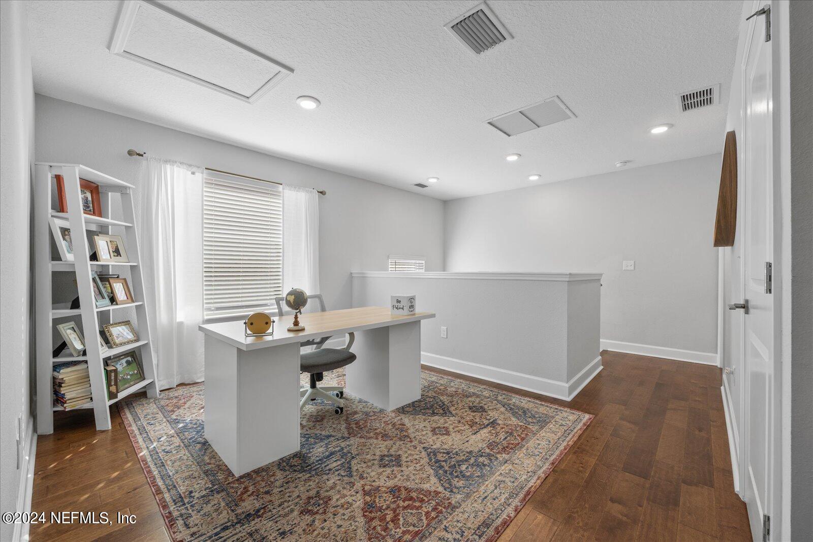196 Ashbury Street St. Augustine, FL 32092 - Photo 14 of 35 a view of a dining room with a table and chairs