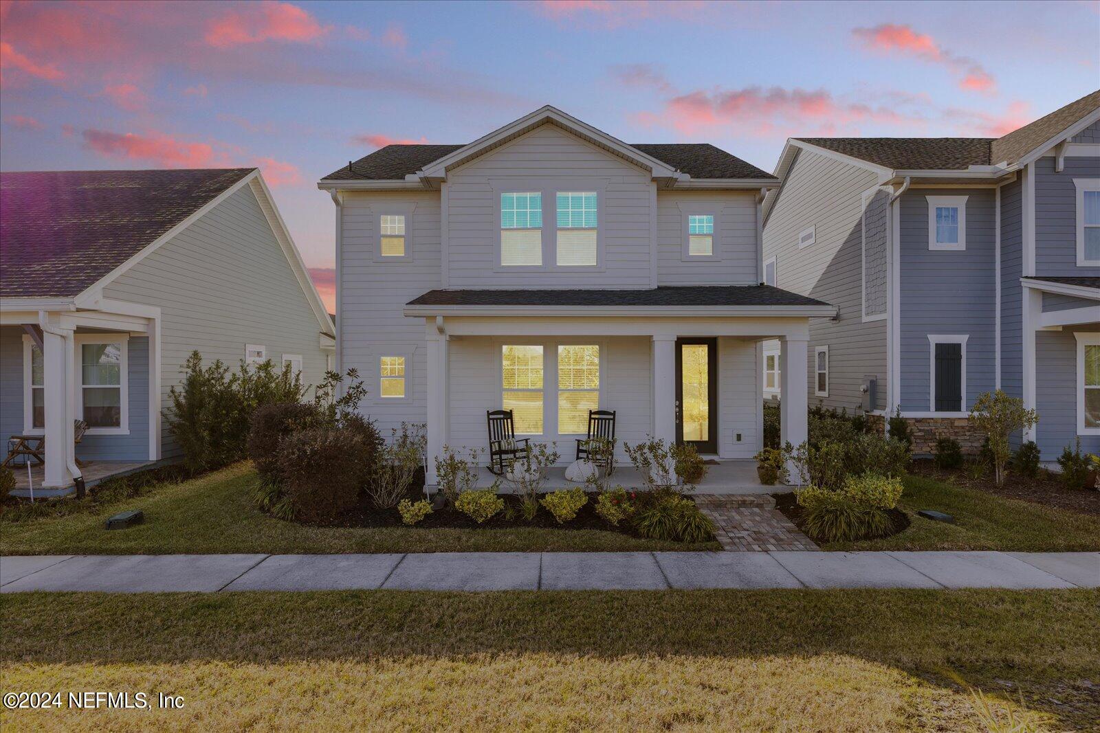 196 Ashbury Street St. Augustine, FL 32092 - Photo 23 of 35 a front view of a house with a yard