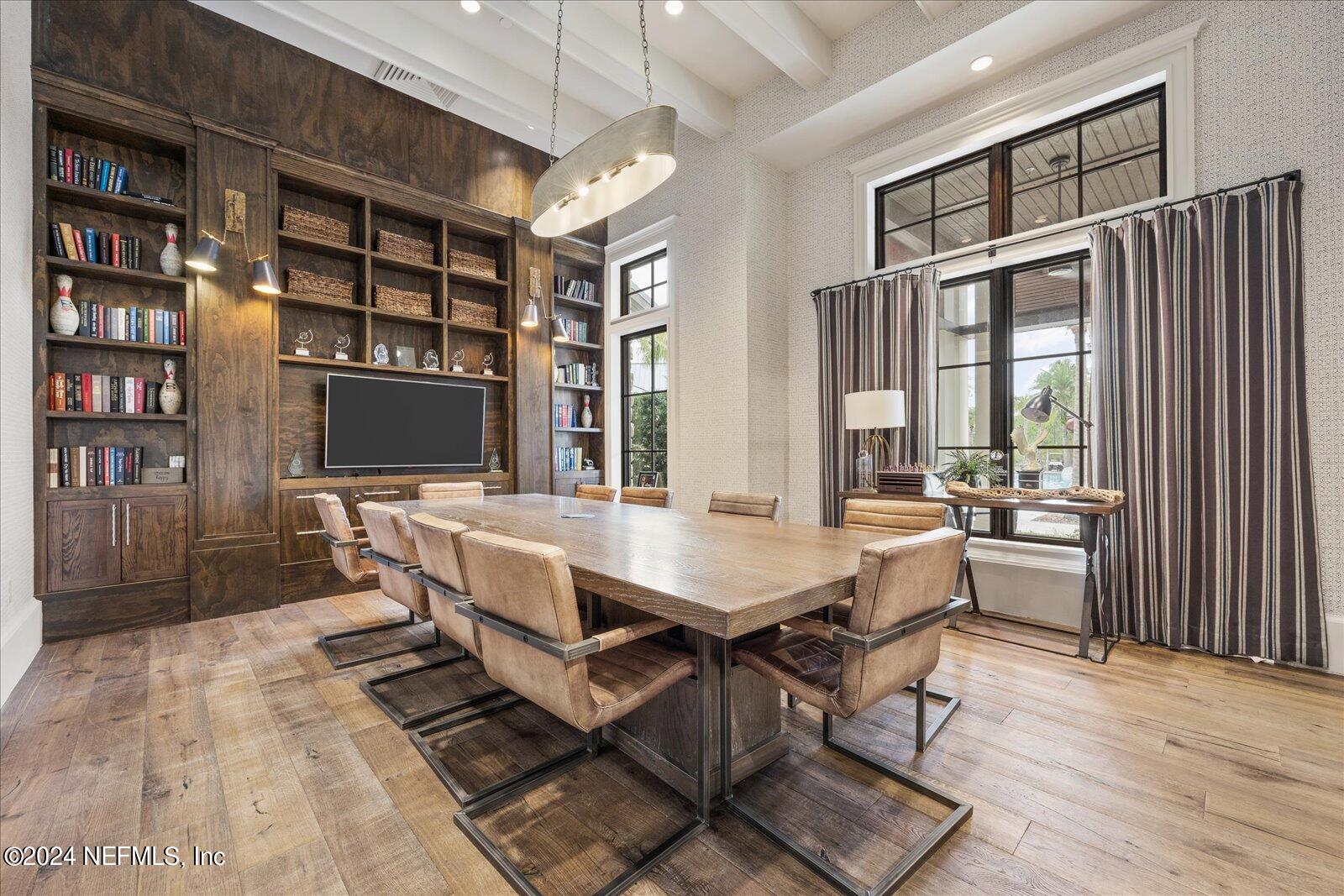 196 Ashbury Street St. Augustine, FL 32092 - Photo 25 of 35 a view of a dining room with furniture window and wooden floor