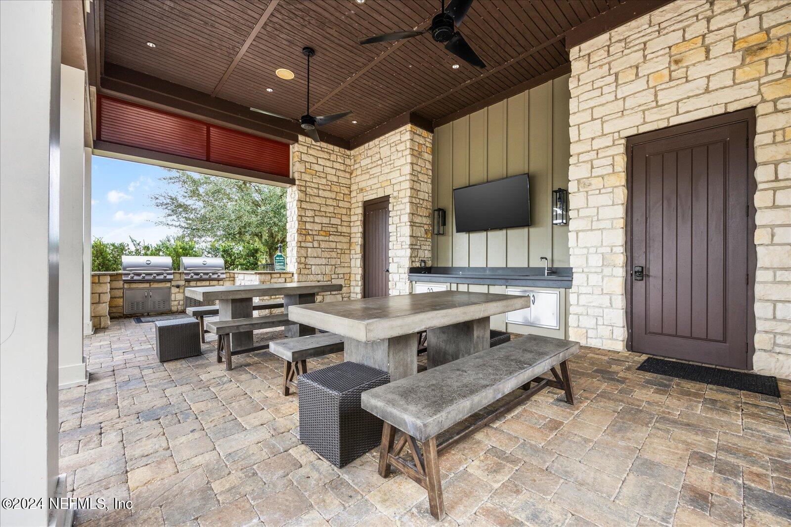 196 Ashbury Street St. Augustine, FL 32092 - Photo 28 of 35 a dinning table and chairs in a room