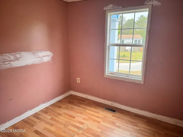 an empty room with a window