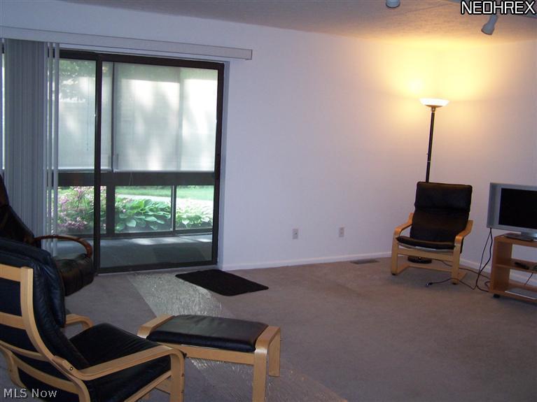 Large Living room with doors to Sun Room