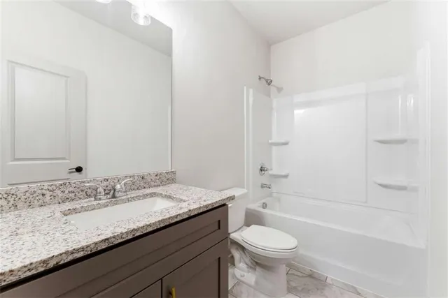 a view of a hallway with windows