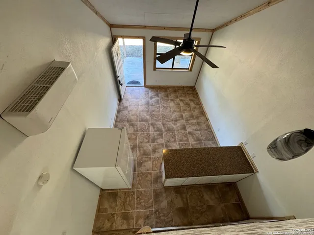 a view of a living room and furniture