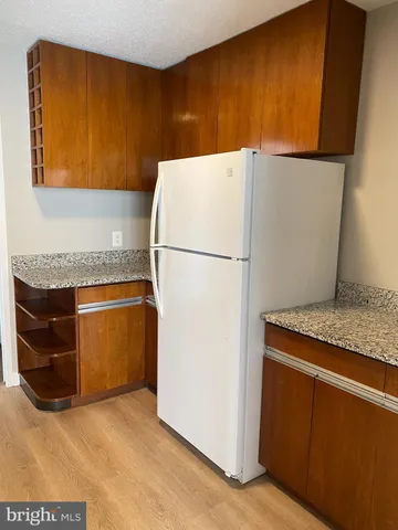 a kitchen with a stove and a microwave