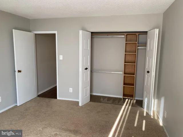 an empty room with closet