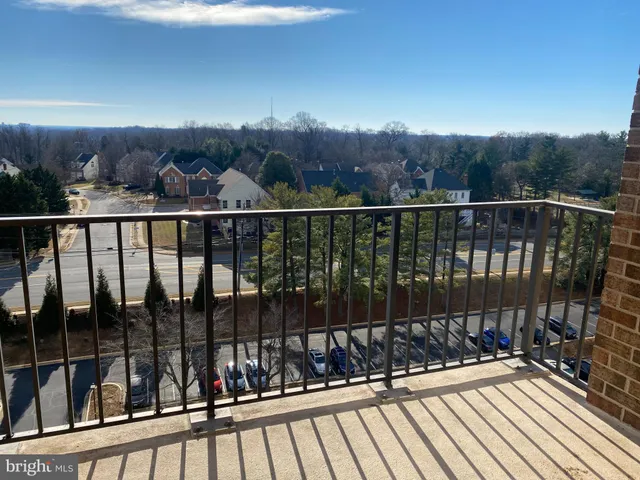 a kitchen with a refrigerator and a stove