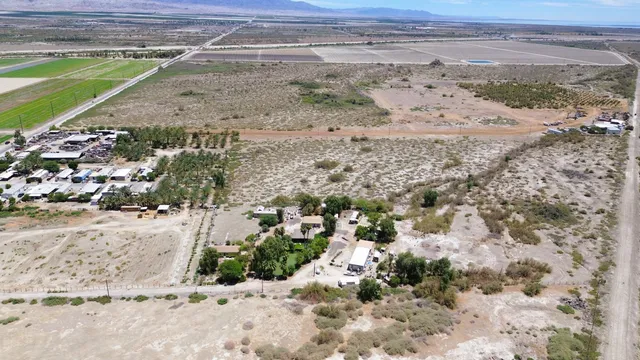 a view of a mountain with an ocean beach