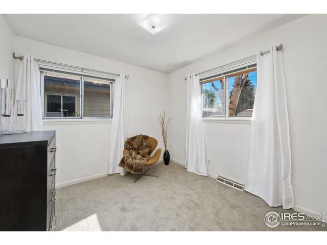 a room with furniture and windows