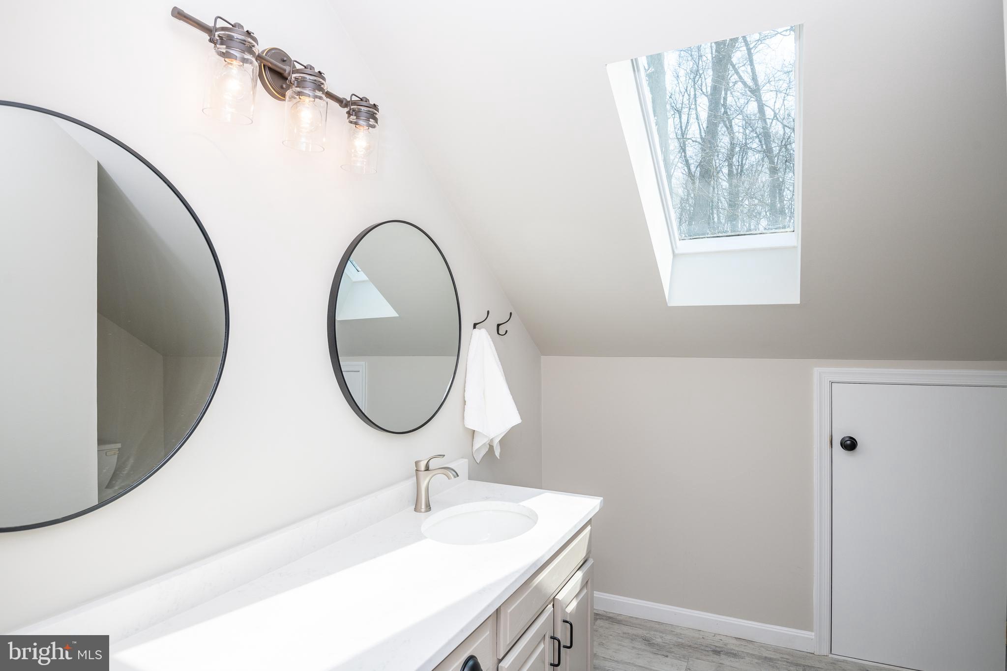 121 East Conestoga Road Elverson, PA 19520 - Photo 29 of 55 Guest bathroom with quartz counters
