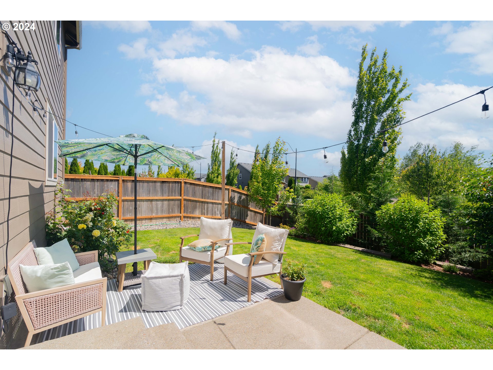 122 North 34th Court Ridgefield, WA 98642 - Photo 43 of 48 a view of a chairs and table in the garden