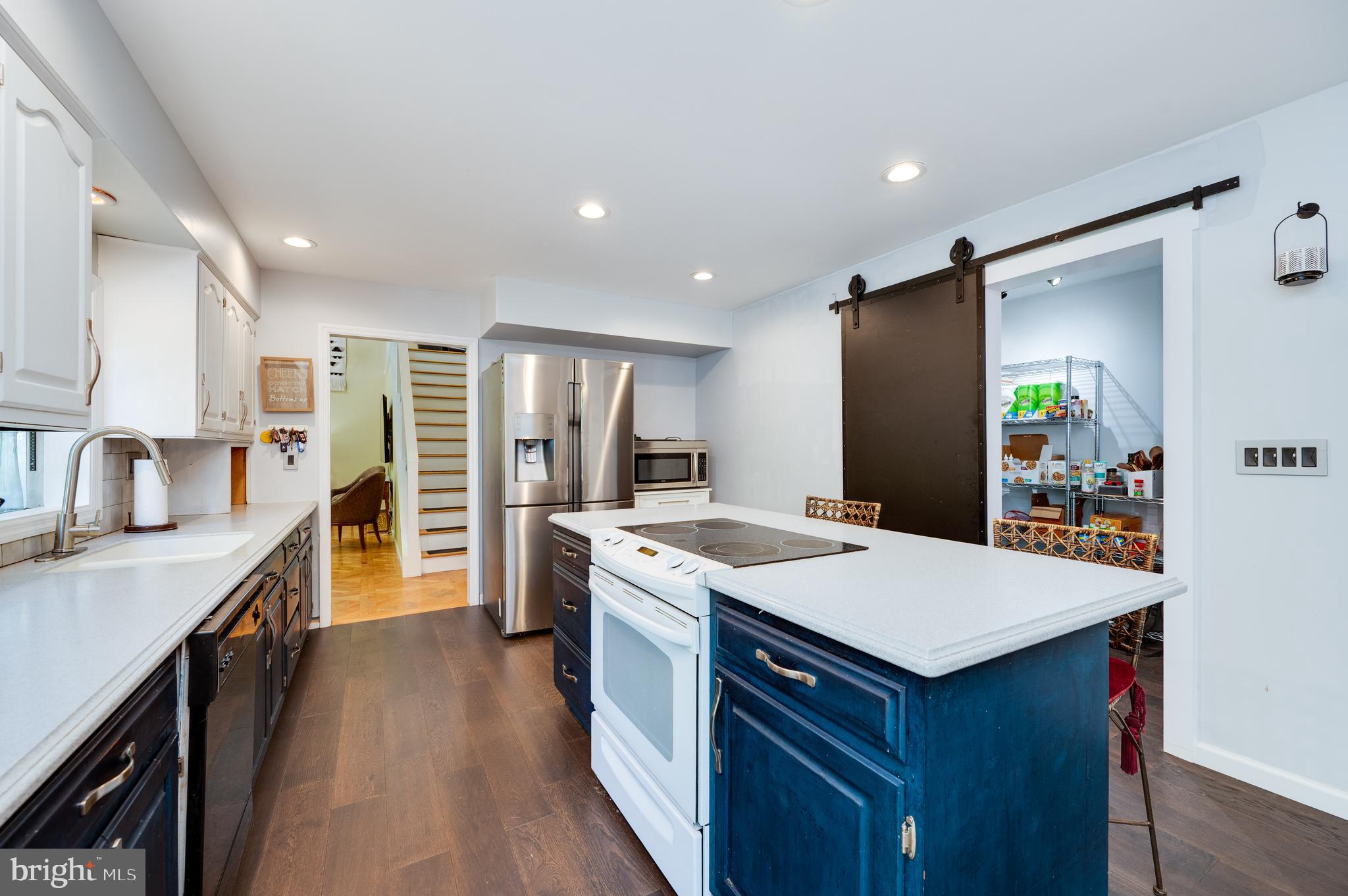 510 Greenhowe Drive Lititz, PA 17543 - Photo 13 of 31 a kitchen with a sink a counter top space stainless steel appliances and cabinets